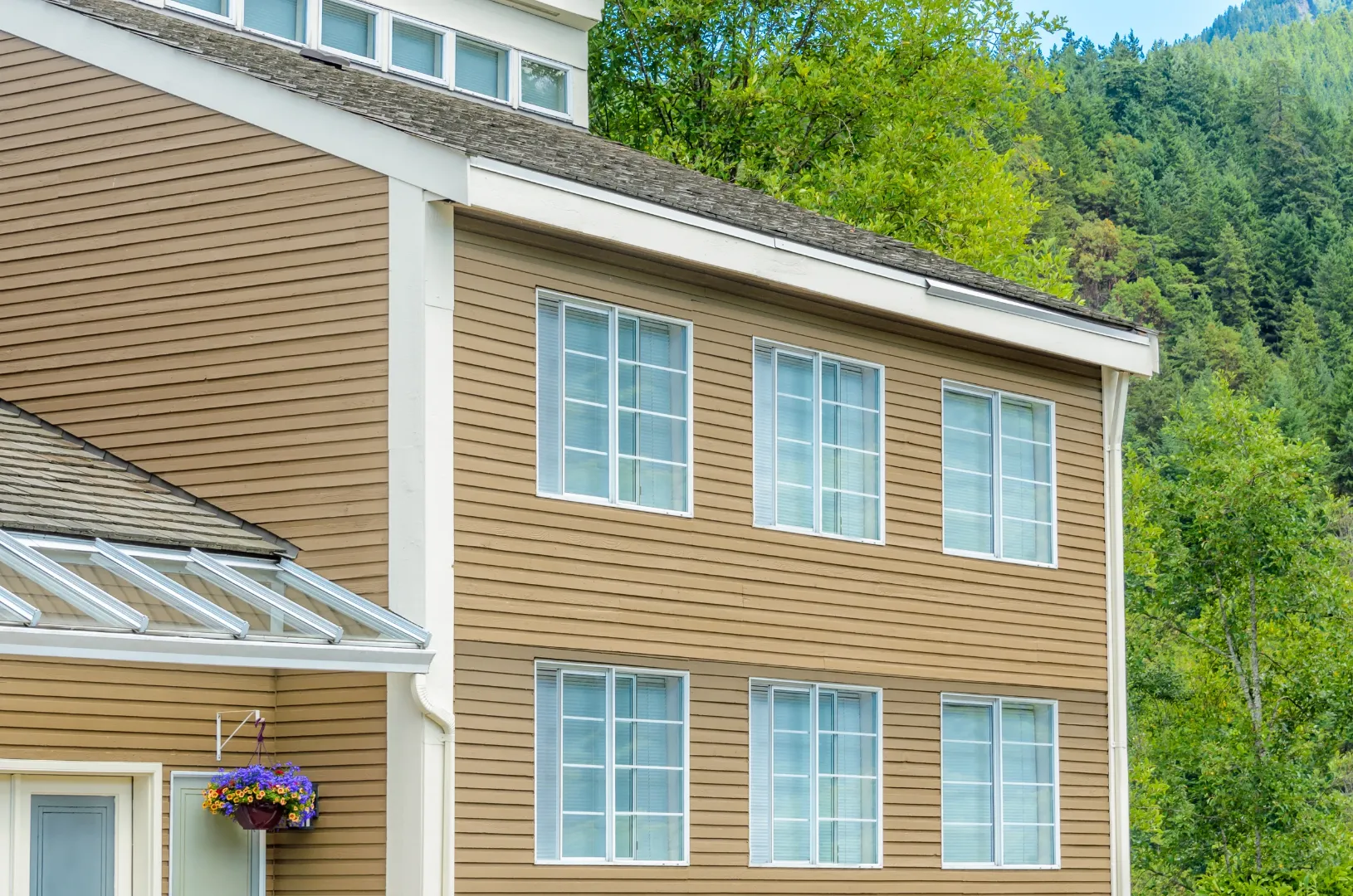 Two-story home showing the exterior siding area and home size